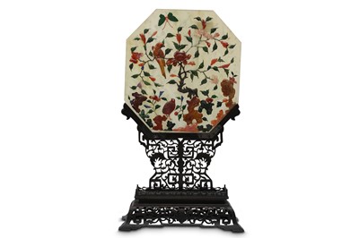 Lot 597 - λ A CHINESE OCTAGONAL HARDSTONE-INLAID JADE PANEL.