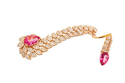 Lot 77 - A pink tourmaline and diamond two-finger dress ring