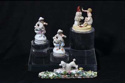 Lot 216 - A early 19th century Staffordshire figure of a child and her poodle