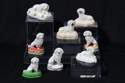 Lot 209 - A Staffordshire porcelain figure of a recumbent poodle, circa 1820-50