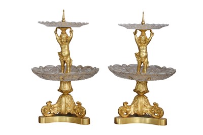 Lot 79 - A PAIR OF EARLY 20TH CENTURY GILT BRONZE AND CUT GLASS TWO-TIER SURTOUT DE TABLE OR TABLE CENTREPIECES