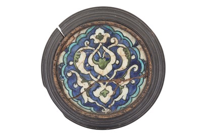Lot 231 - A SMALL CIRCULAR DAMASCUS POTTERY TILE