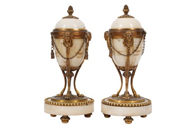 Lot 78 - A PAIR OF LATE 19TH CENTURY FRENCH WHITE MARBLE AND GILT BRONZE CASOLETTES
