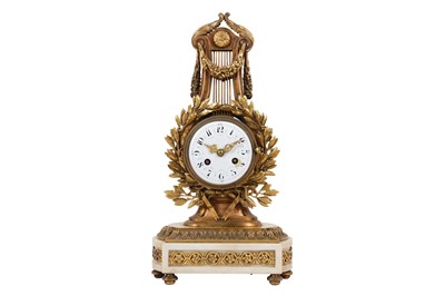 Lot 27 - A LATE 19TH CENTURY FRENCH GILT BRONZE AND WHITE MARBLE LYRE MANTEL CLOCK