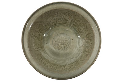 Lot 663 - A CELADON-GLAZED BOWL.