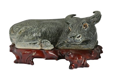 Lot 592 - A CHINESE BISCUIT GREEN-GLAZED MODEL OF A BUFFALO.