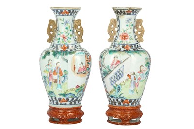 Lot 571 - A PAIR OF CHINESE FAMILLE ROSE WALL VASES.