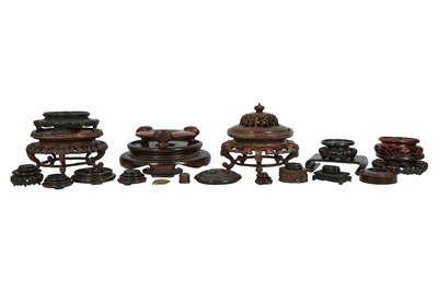 Lot 746 - TWENTY-SEVEN CHINESE WOOD STANDS.