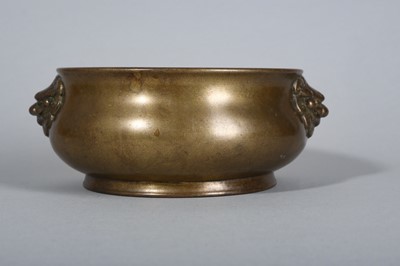 Lot 59 - A CHINESE BRONZE 'LION HEAD' INCENSE BURNER.