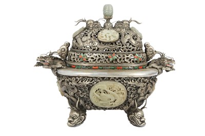 Lot 509 - A JADE AND HARDSTONE-INSET WHITE METAL 'DRAGONS' INCENSE BURNER.