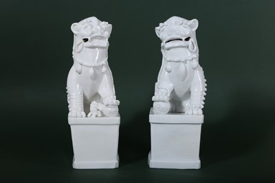 Lot 167 - A PAIR OF CHINESE BLANC-DE-CHINE JOSS STICK HOLDERS.