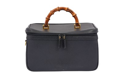 Lot 89 - Gucci Navy Bamboo Vanity Case