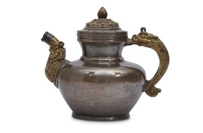 Lot 761 - A TIBETAN PEWTER AND COPPER MILK TEAPOT AND COVER.