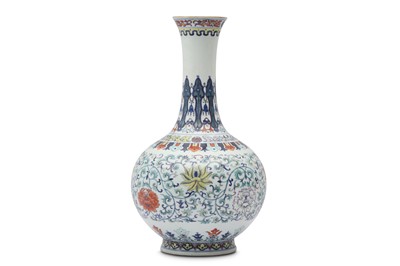 Lot 661 - A CHINESE DOUCAI 'LOTUS' BOTTLE VASE.