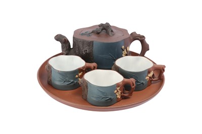 Lot 271 - A CHINESE YIXING ZISHA 'THREE FRIENDS OF WINTER' TEASET.