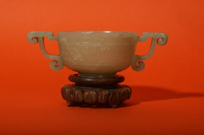 Lot 92 - A CHINESE PALE CELADON JADE CUP.