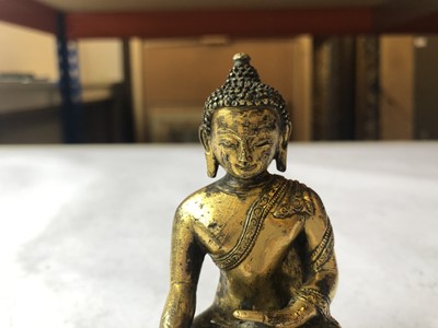 Lot 413 - A CHINESE GILT-BRONZE FIGURE OF SAKYAMUNI BUDDHA.