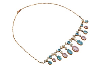 Lot 1210 - A pink topaz, aquamarine, pearl and diamond necklace, circa 1910