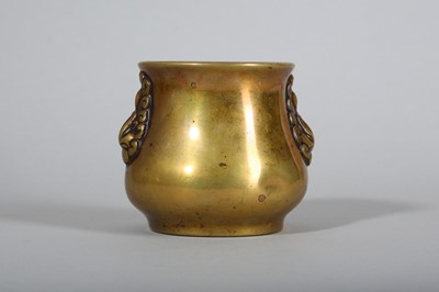 Lot 53 - A CHINESE TWIN HANDLED BRONZE INCENSE BURNER.