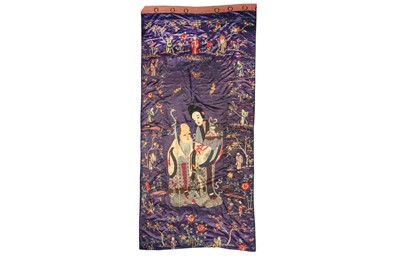 Lot 388 - A CHINESE PURPLE-GROUND 'SHOULAO AND MAGU' EMBROIDERED SILK PANEL.