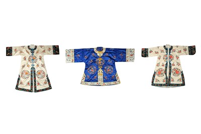 Lot 739 - THREE CHINESE EMBROIDERED SILK ROBES.