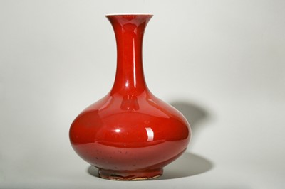 Lot 34 - A CHINESE COPPER RED-GLAZED BOTTLE VASE.