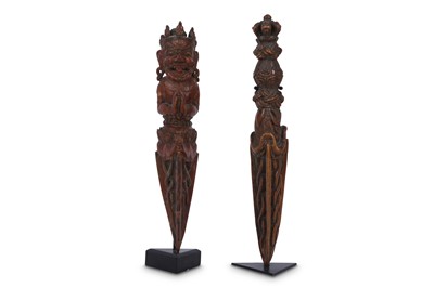 Lot 751 - TWO TIBETAN WOOD PHURBAS.