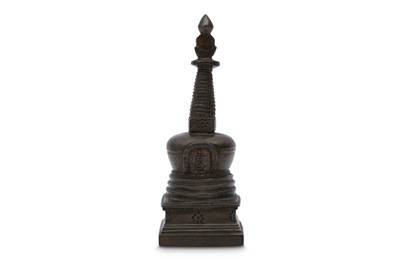 Lot 752 - A TIBETAN BRONZE STUPA.