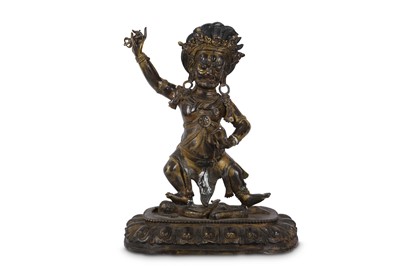 Lot 681 - A LARGE TIBETAN GILT-BRONZE FIGURE OF VAJRAPANI.