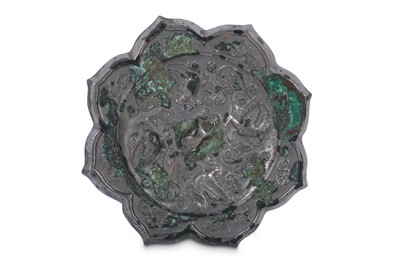 Lot 548 - A CHINESE TANG-STYLE SILVER MIRROR.