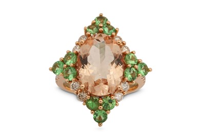 Lot 1221 - A morganite, green garnet and diamond dress ring