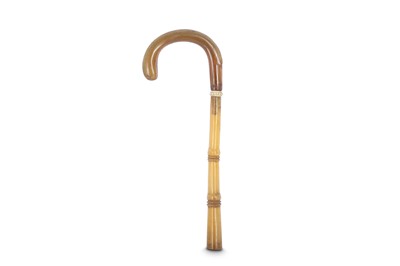 Lot 359 - λ A CARVED RHINOCEROS HORN HANDLE.