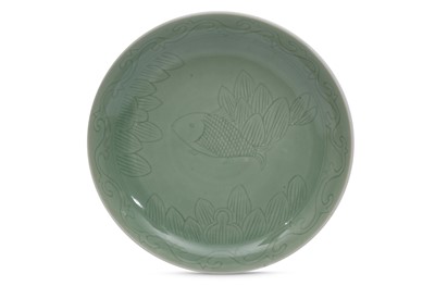 Lot 707 - A CHINESE CELADON-GLAZED 'FISH' DISH.