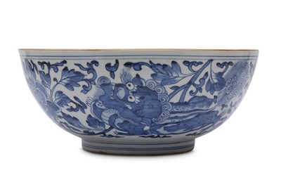 Lot 427 - A BLUE ANE WHITE 'LION DOG' PUNCH BOWL.