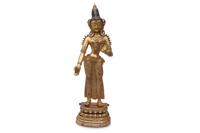 Lot 409 - A NEPALESE GILT-BRONZE FIGURE OF PADMAPANI.