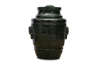 Lot 677 - A CHINESE SPINACH-GREEN JADE JAR AND COVER.