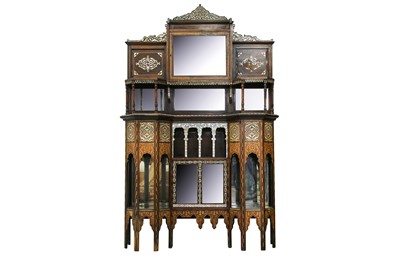 Lot 843 - λ A HARDWOOD MOTHER-OF-PEARL-INLAID LIBERTY & CO. OTTOMAN-REVIVAL ORIENTALIST CUPBOARD
