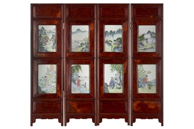 Lot 344 - A CHINESE FAMILLE ROSE BURLWOOD FOUR-FOLD SCREEN.