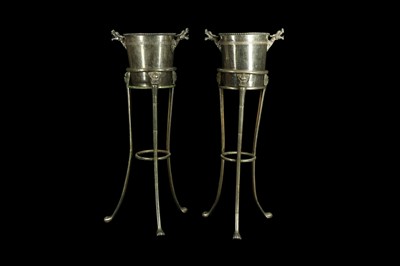 Lot 65 - A PAIR OF 20TH CENTURY SILVERED METAL CHAMPAGNE BUCKETS ON STANDS