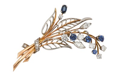 Lot 1306 - A sapphire and diamond flower brooch