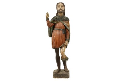 Lot 549 - A LARGE SPANISH OR PORTUGUESE POLYCHROME DECORATED CARVED WOOD FIGURE OF ST ROCH, 19TH CENTURY