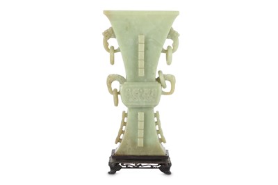 Lot 707 - A CHINESE PALE CELADON JADE ARCHAISTIC VASE, GU.