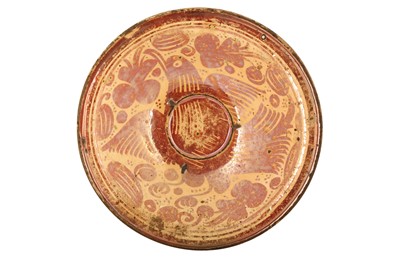 Lot 86 - A SMALL HISPANO-MORESQUE COPPER LUSTRE-PAINTED POTTERY DISH