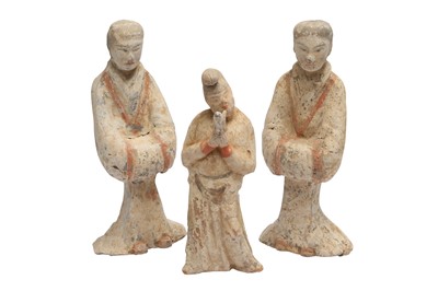 Lot 220 - THREE CHINESE POTTERY FIGURES.