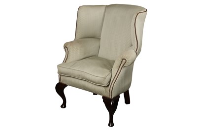 Lot 142 - A GEORGE II MAHOGANY WING BACK ARMCHAIR