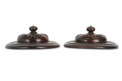 Lot 692 - A PAIR OF CHINESE WOOD COVERS.
