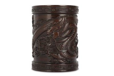 Lot 682 - A CHINESE WOOD 'DRAGON' BRUSH POT, BITONG.