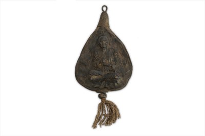 Lot 388 - A TIBETAN LEATHER VOTIVE PLAQUE.