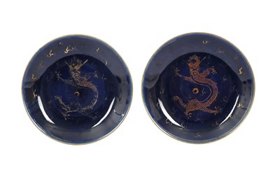 Lot 122 - A PAIR OF BLUE-GLAZED GILT-DECORATED 'DRAGON' DISHES.