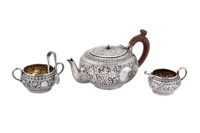 Lot 343 - A Victorian three-piece bachelor tea service, London 1883 by Aldwinkcle and Slater